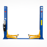 Two-Post Car Lift Engineered for Professional Use, 12,000 lb Capacity, Clear-Floor Design, Asymmetric Arms